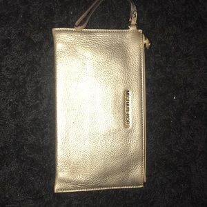 Gold micheal Kors wristlet